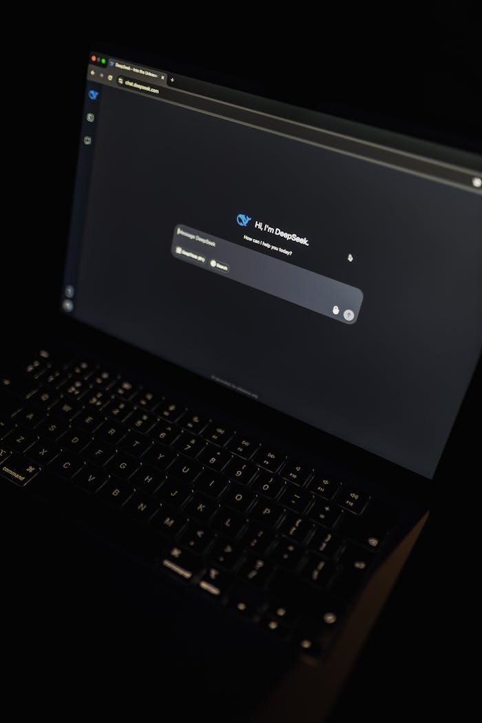 gallery-3 A dark-themed laptop screen displaying the DeepSeek AI interface, highlighting modern technology.